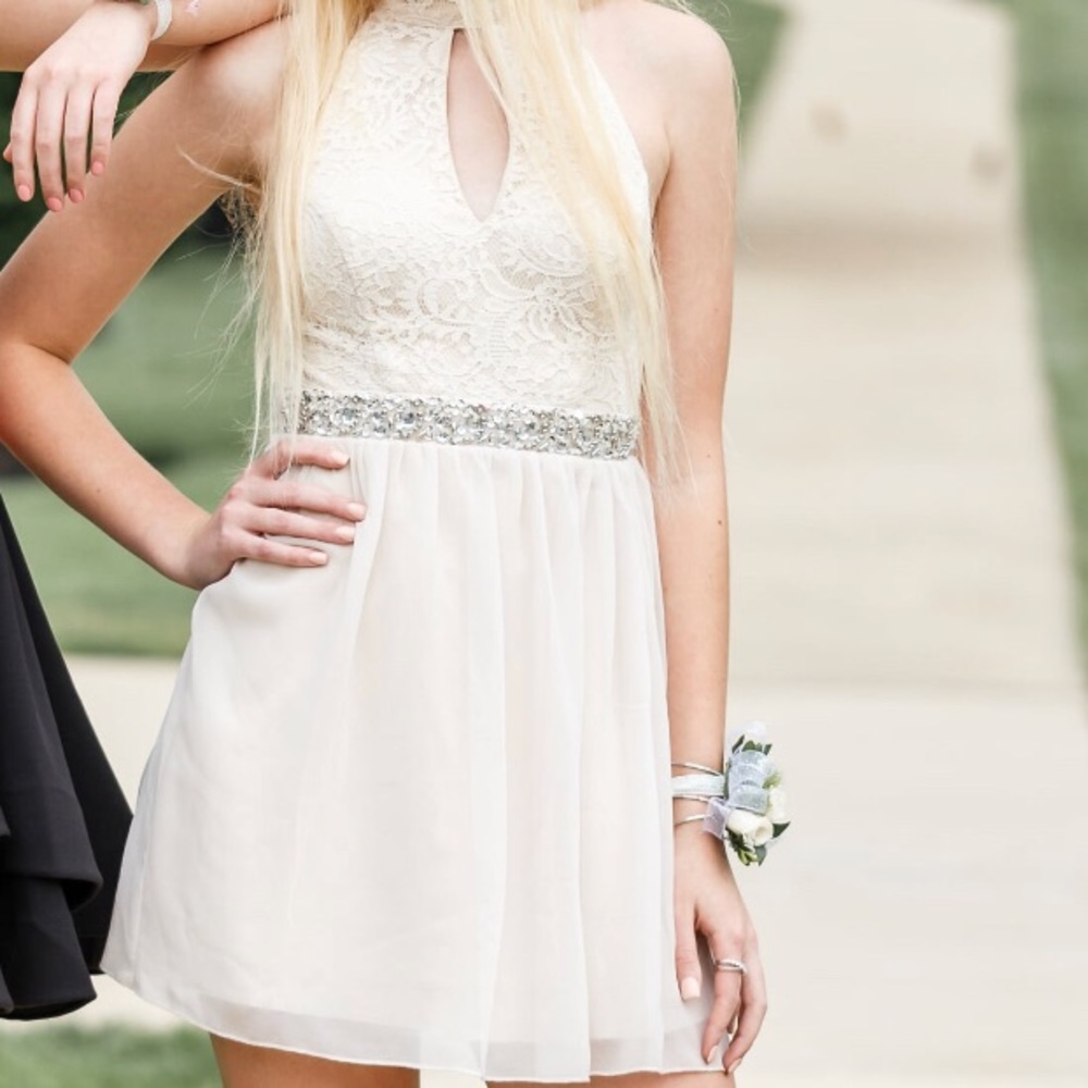 white dress with lace top and jewel waist